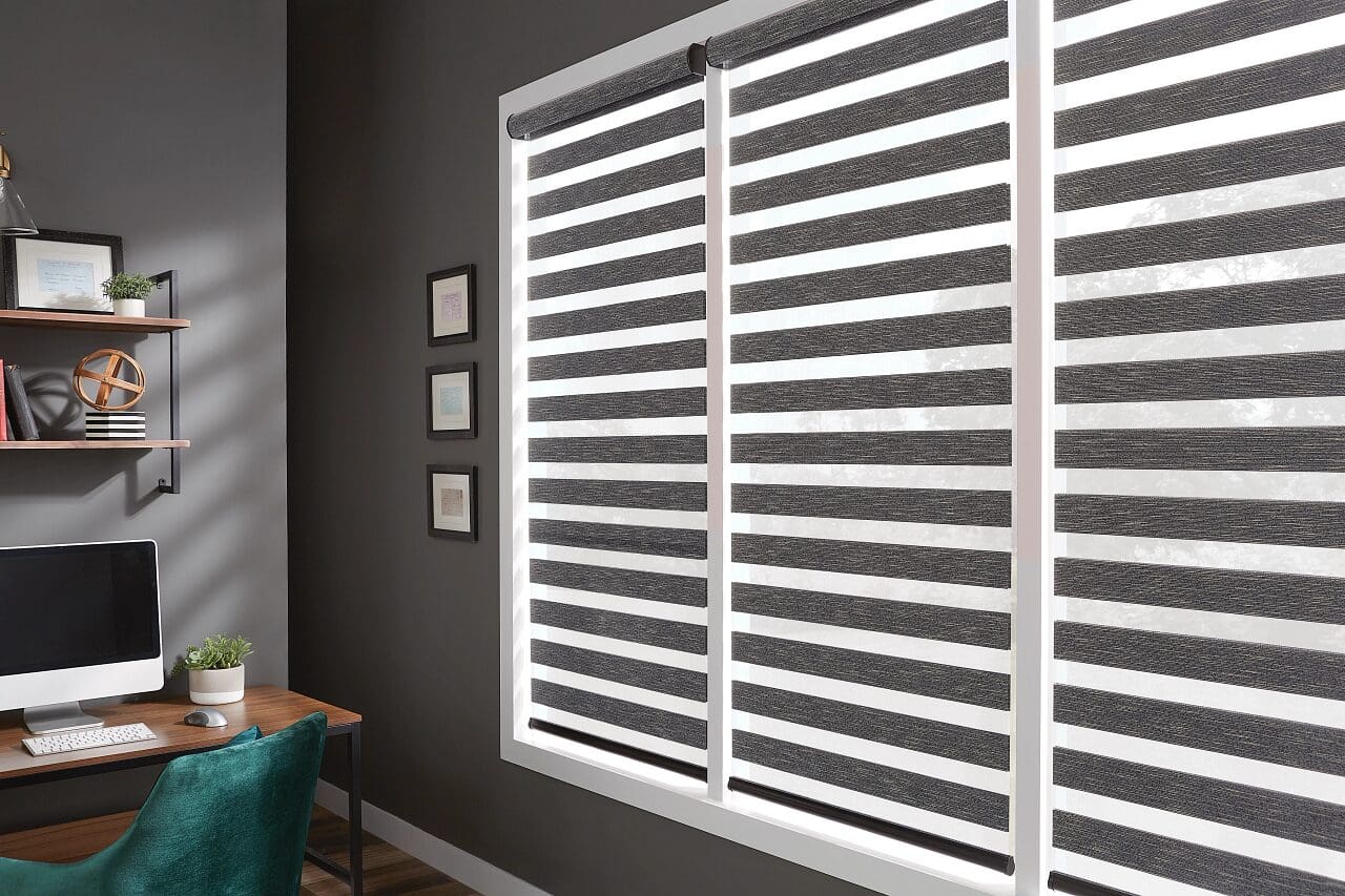 Gray window shades in a home office.